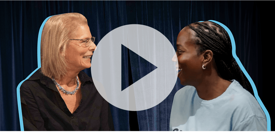 A Shine Maker speaking to a member of the Upright Citizens Brigade 