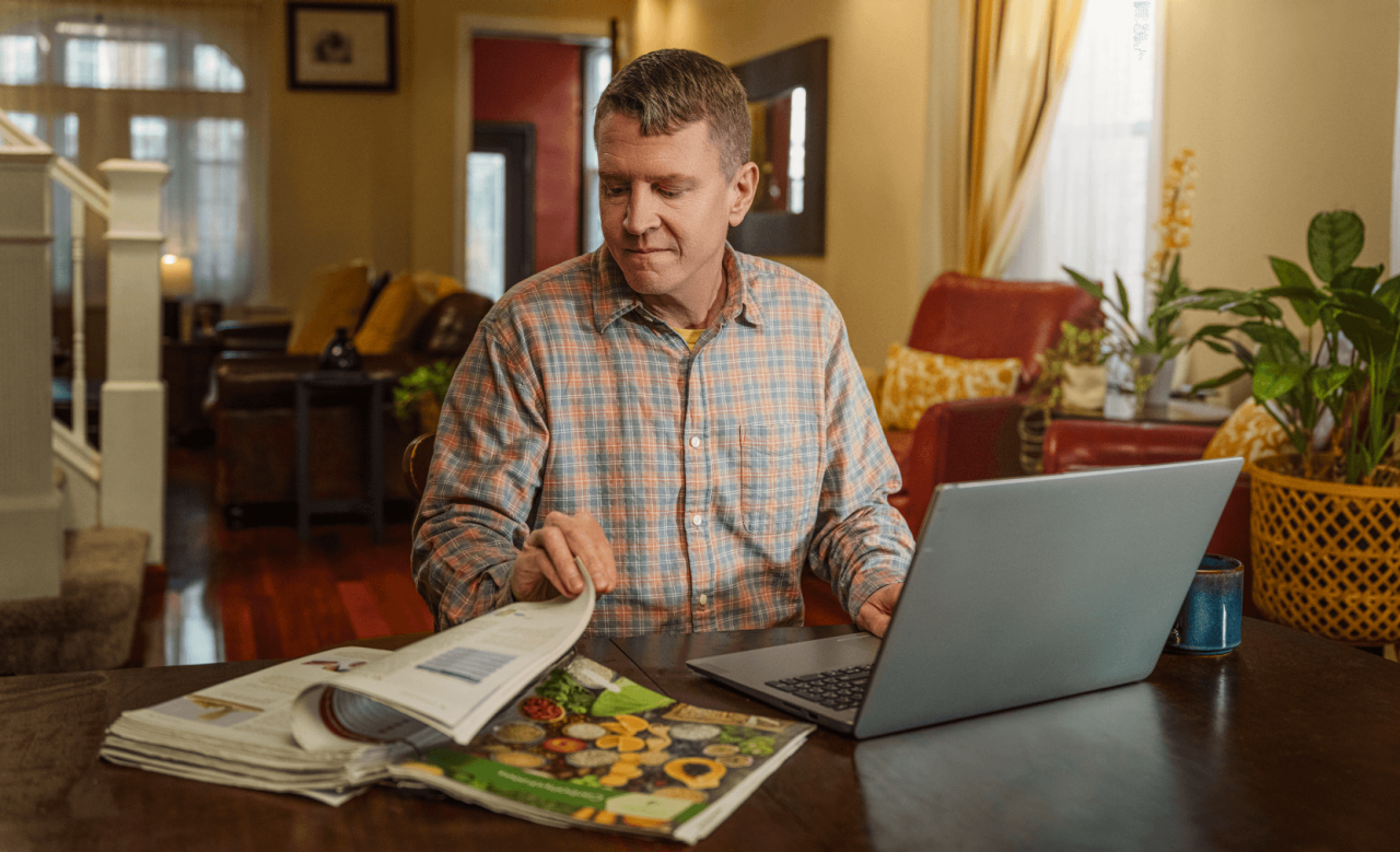 Mike flipping through a nutrition book.